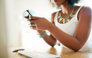 Woman on phone and computer